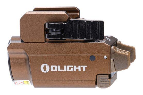 Olight Tan Baldr Mini 600 Lumen Flashlight with Green Laser Sight has a quick-flip switch for mode adjustment.